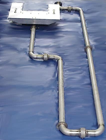 Skim-Pak floating oil skimmer system providing continuous oil removal in industrial containment tanks